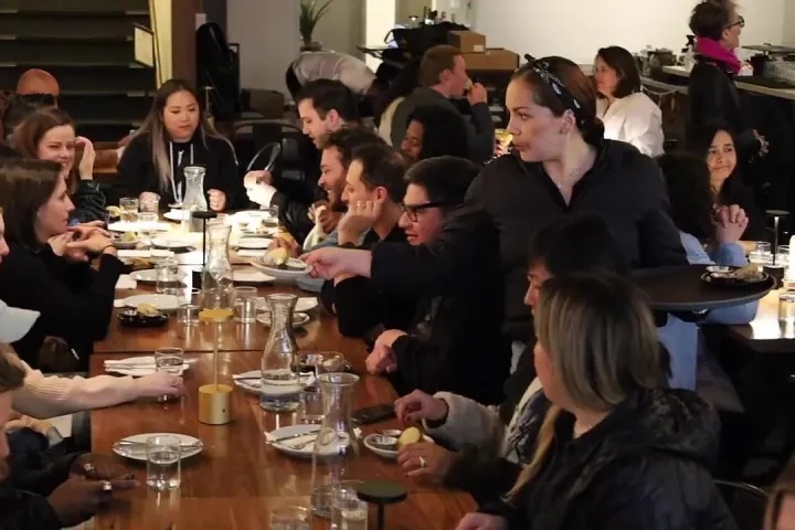 Group of guests sharing a meal on a Mission District Food Tour