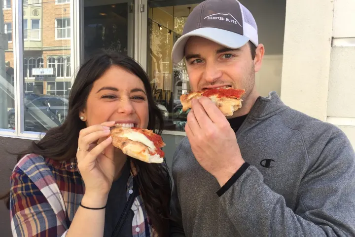 Guests tasting pizza on the Mission District Food Tour, San Francisco