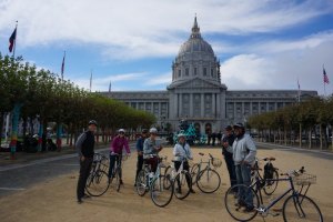 people enjoying a bike ride around san francisco