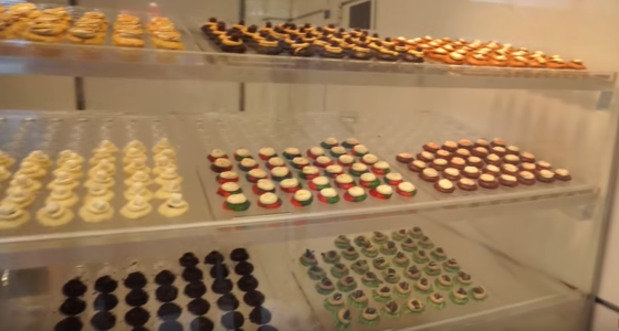 A bakery display case finishes our food tour with a sweet ending.