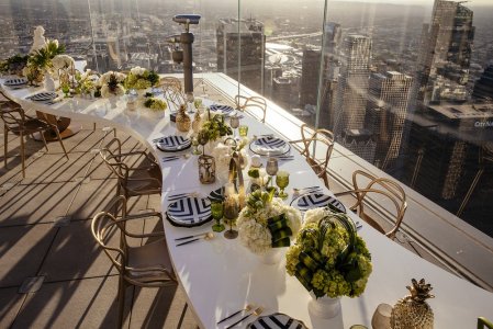 Rooftop table with a view of Downtown LA