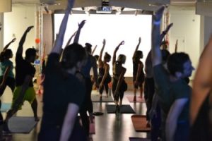 a group of people doing yoga