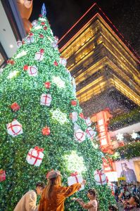 a large christmas tree in the city