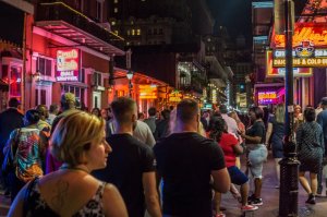crowd of people enjoying an outdoor marketplace