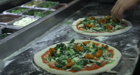 a pizza sitting on top of a table