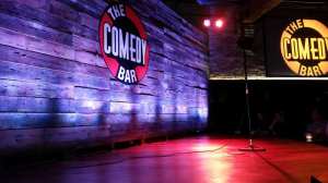 a red stop sign sitting on the floor