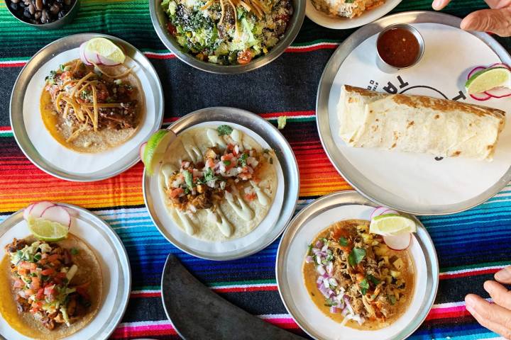 a bowl filled with different types of food on a table