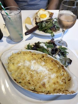 a plate of baked cheesy pasta