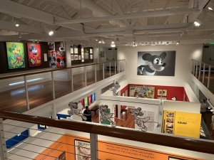 a view from a balcony showing several photos of Micky Mouse