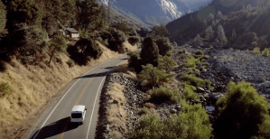 a close up of a car going down the side of a mountain