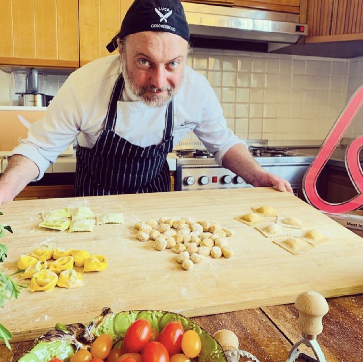 a person sitting at a table with food
