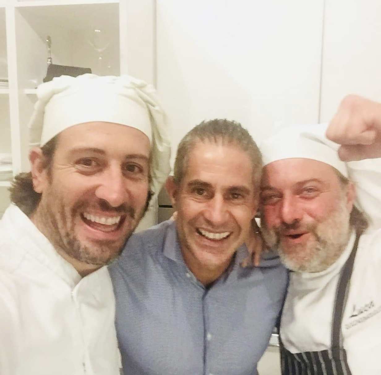 Sylvinho et al. posing for the camera