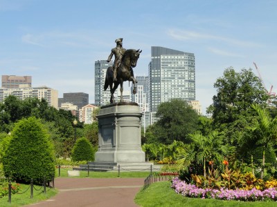 a statue in front of a building