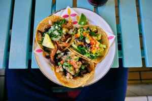 Sidewalk Food Tours Chicago Walking Tour. a plate of food on a table