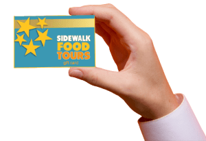 a hand holding a cell phone