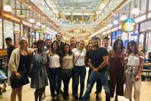 a group of people standing in front of a crowd