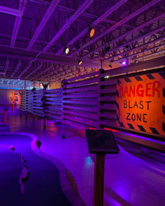 an entertainment center called Shipwrecked which features a Danger sign inside their puttputt course