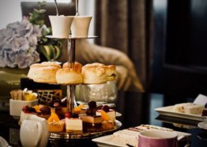 a stand of pastries and cakes at high tea