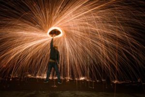 A person doing firework throwing at night