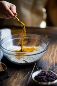 spices going into a bowl