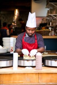 a person preparing food in a kitchen