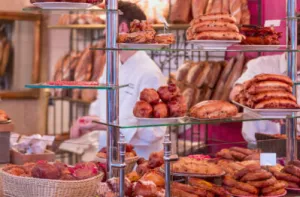 Cafe and grand bakery (croissant) shop interior in downtown - Paris, France