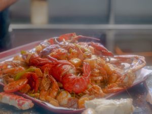 a plate of seafood boil food