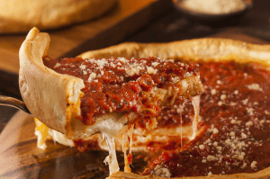 a close up of a slice of pizza