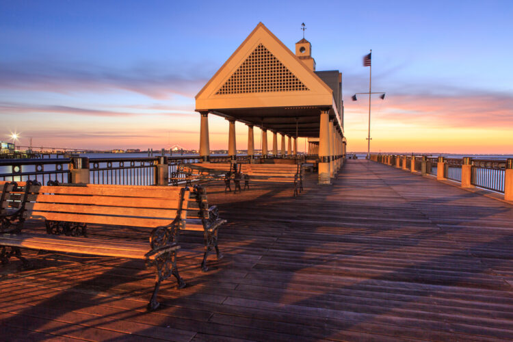 Outdoor benches and seating pavilion at Waterfront Park in the downtown Charleston, South Carolina harbor.