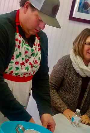 a couple of people that are sitting on a table