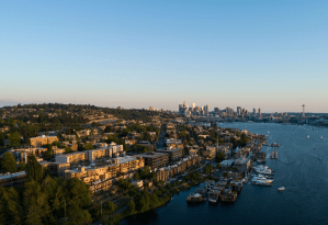 a large body of water with a city in the background