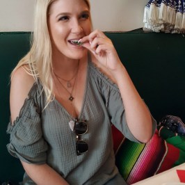 a woman sitting at a table