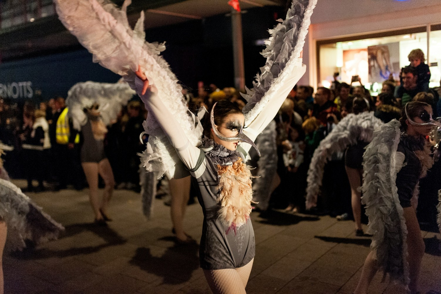 someone dressed up walking in the Krewe of Boo parade in New Orleans