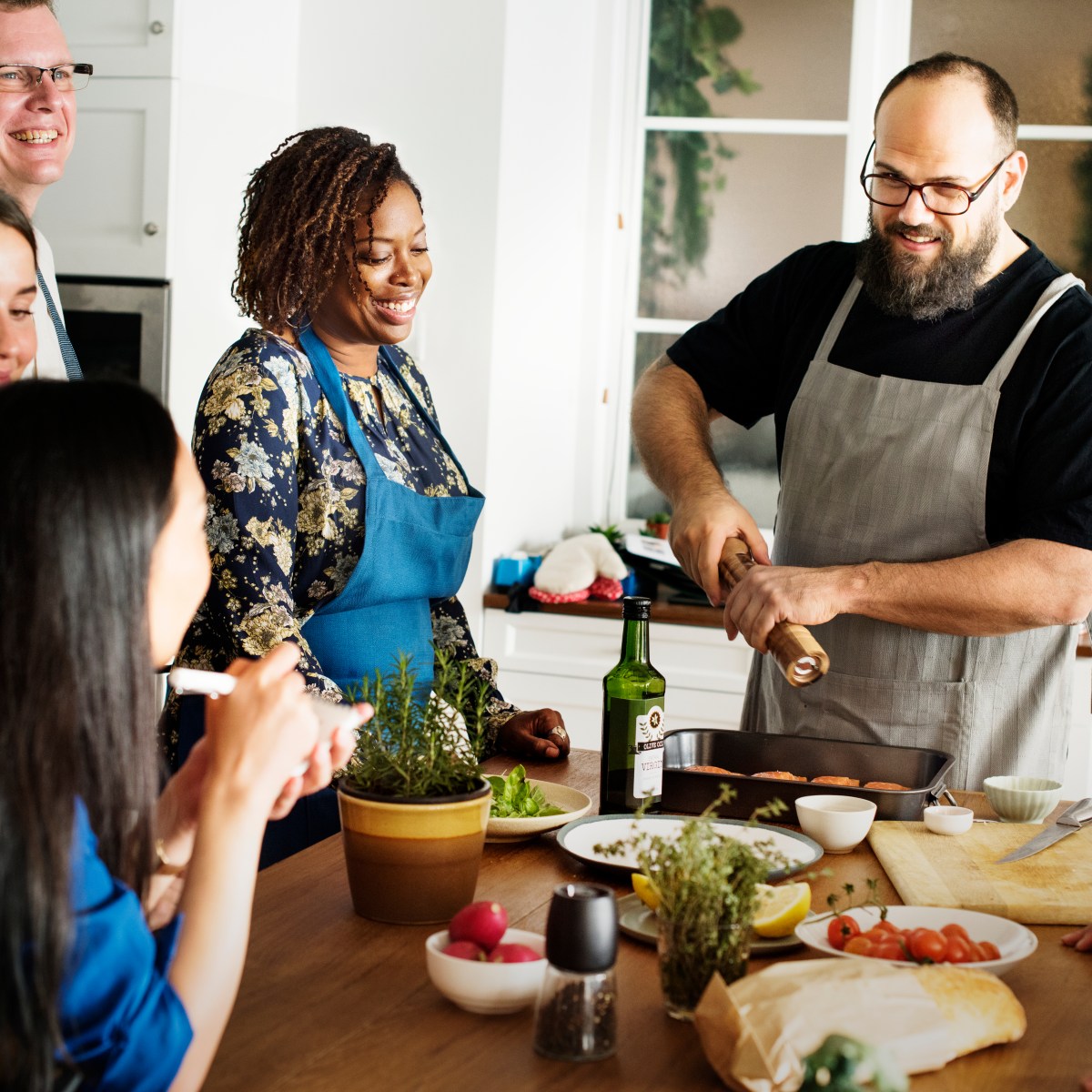 People participating in a team building cooking class in Nashville