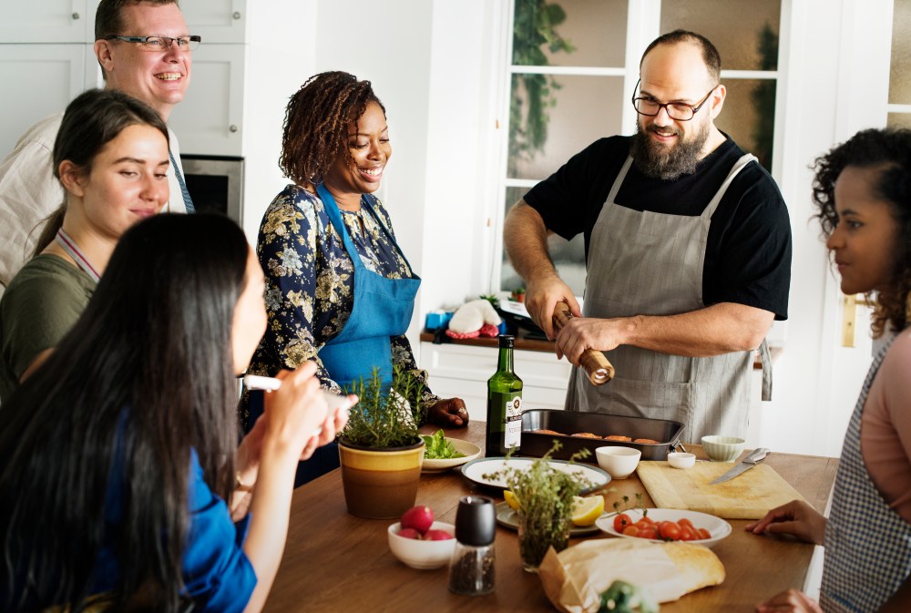 People participating in a team building cooking class in Nashville