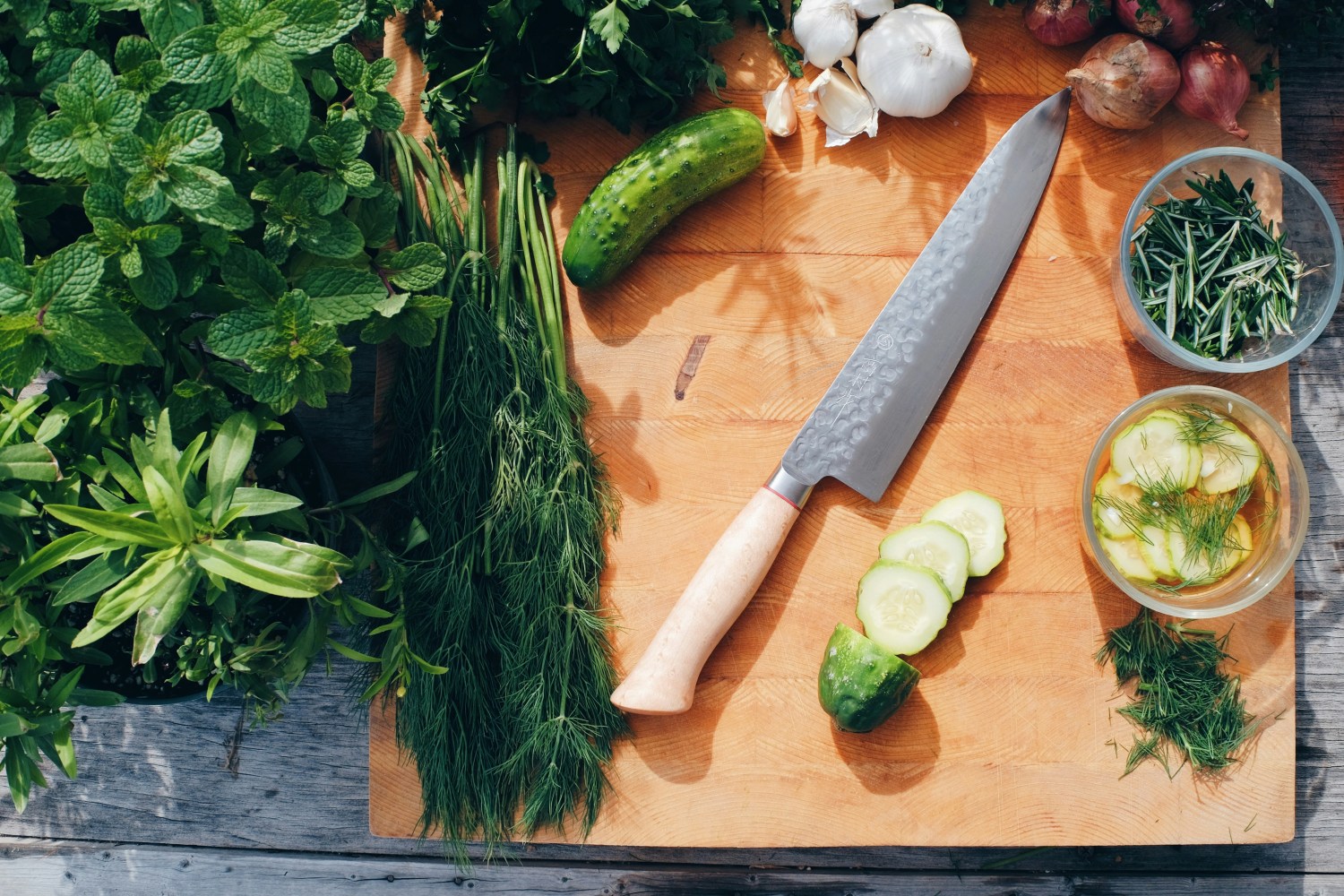 a group of broccoli on a cutting board