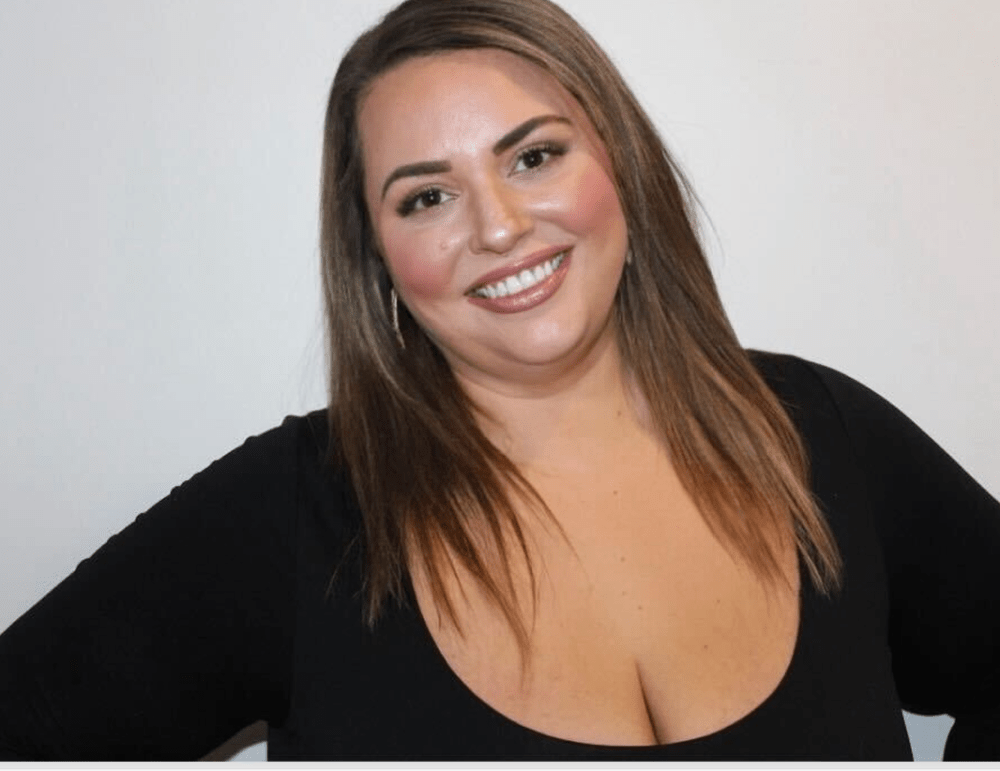 a woman smiling for the camera